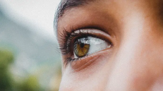 persons eye in close up photography